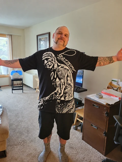 Real customer wearing the ALEX PEREIRA II tee