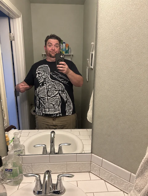 Real customer wearing the CHARLES OLIVEIRA III tee