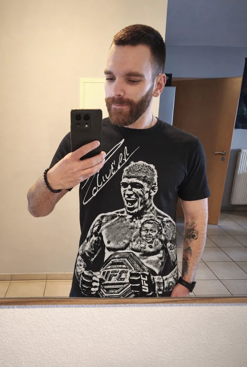Real customer wearing the CHARLES OLIVEIRA tee